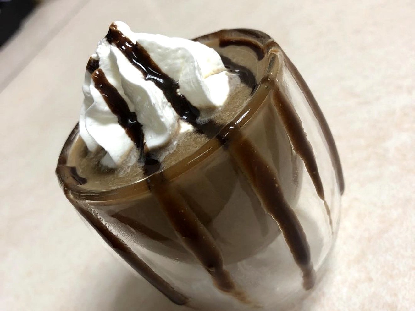 Chocolate drizzle frappe with whipped cream from Four Seasons